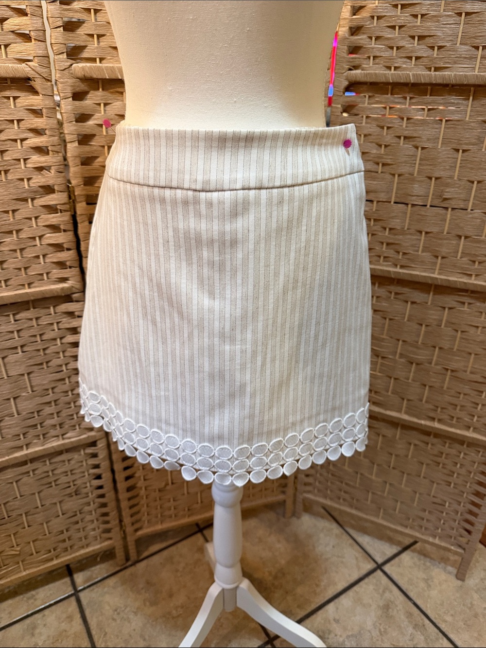 Attyre Cream Pinstripe Mini Skirt with Circular Eyelet Hem